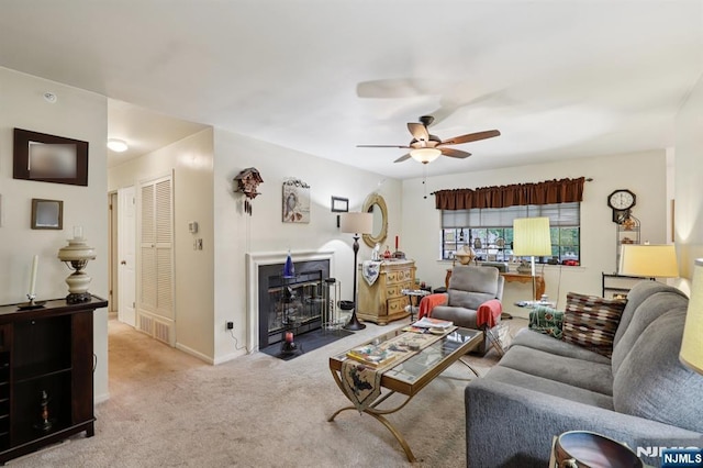 1907 Faulkner Ct, Mahwah, NJ 07430 - carpeted living area featuring ceiling fan and a fireplace with flush hearth