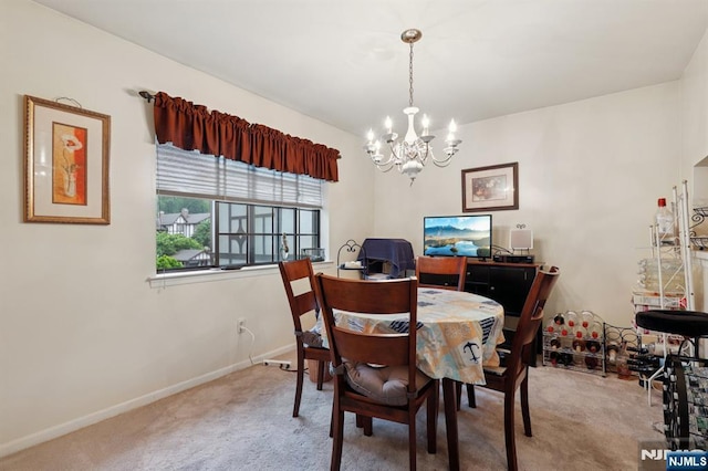 1907 Faulkner Ct, Mahwah, NJ 07430 - carpeted dining area with a chandelier and baseboards