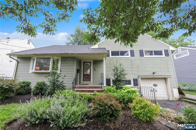 28 Urma Pl, Bloomfield, NJ 07003 - tri-level home featuring a garage and asphalt driveway