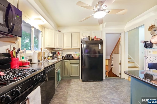 28 Urma Pl, Bloomfield, NJ 07003 - kitchen with black appliances, a ceiling fan, white cabinetry, light floors, and dark stone counters