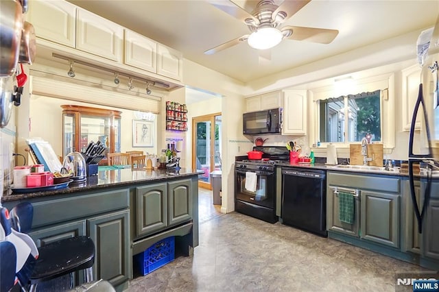 28 Urma Pl, Bloomfield, NJ 07003 - kitchen featuring black appliances, dark countertops, a ceiling fan, and white cabinets