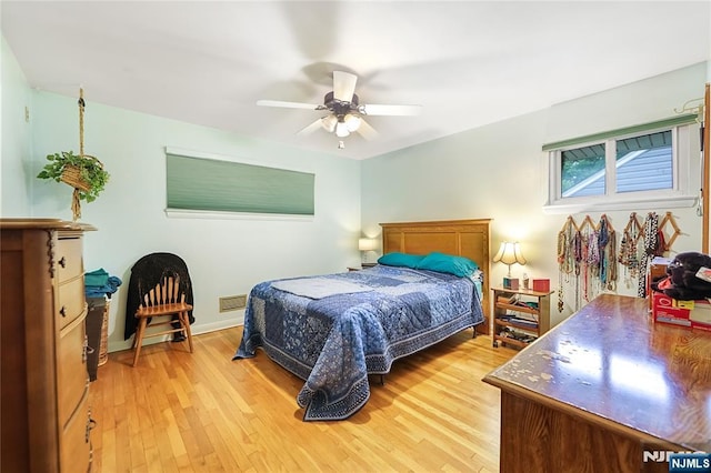 28 Urma Pl, Bloomfield, NJ 07003 - bedroom with light wood-style flooring and ceiling fan