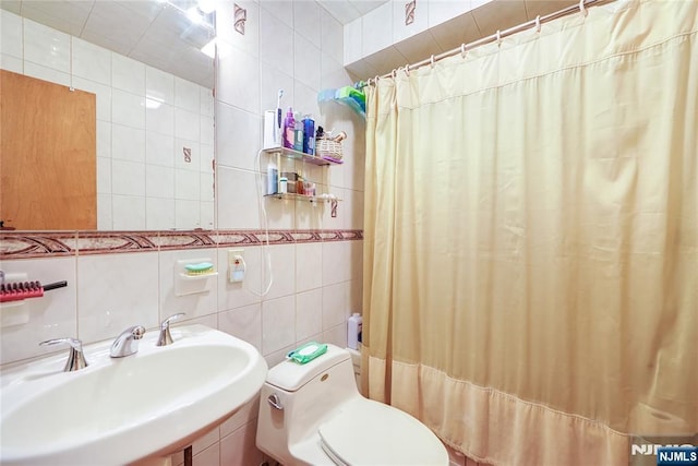 28 Urma Pl, Bloomfield, NJ 07003 - bathroom featuring tile walls and a shower with curtain