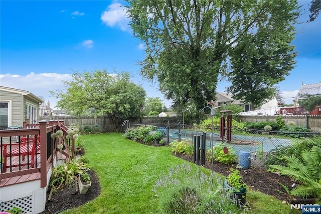 28 Urma Pl, Bloomfield, NJ 07003 - fenced backyard with a deck