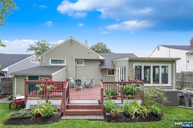 28 Urma Pl, Bloomfield, NJ 07003 - rear view of house featuring a deck and roof with shingles