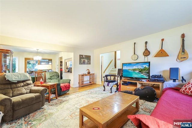 28 Urma Pl, Bloomfield, NJ 07003 - living room featuring a chandelier and wood finished floors