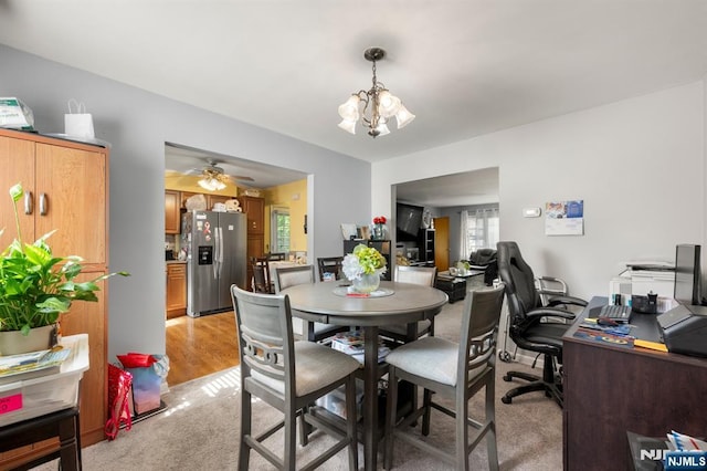 105 Old Hoboken Rd, Hackensack, NJ 07601 - dining area featuring a chandelier, light colored carpet, an office area, and a ceiling fan