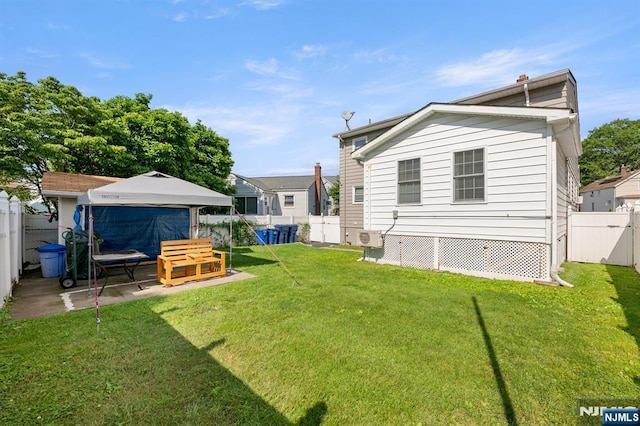 105 Old Hoboken Rd, Hackensack, NJ 07601 - rear view of property with a fenced backyard, a gazebo, and a patio