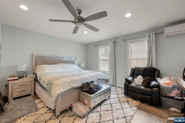 105 Old Hoboken Rd, Hackensack, NJ 07601 - bedroom with an AC wall unit, recessed lighting, wood finished floors, and a ceiling fan