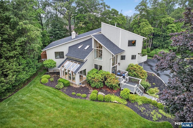11 Country Ln, Mahwah, NJ 07430 - rear view of house with a shingled roof, a yard, a chimney, and a wooden deck