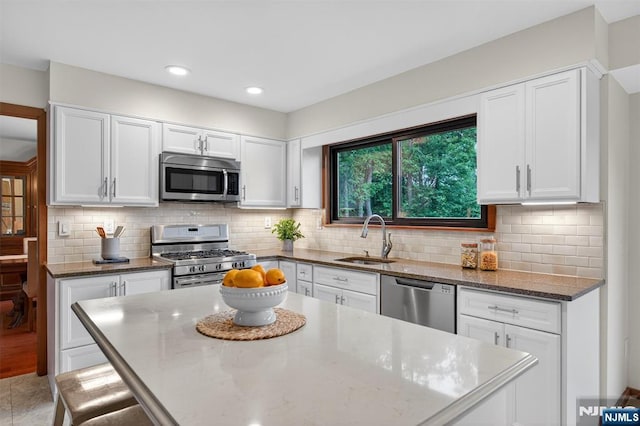 11 Country Ln, Mahwah, NJ 07430 - kitchen featuring appliances with stainless steel finishes, white cabinetry, and recessed lighting