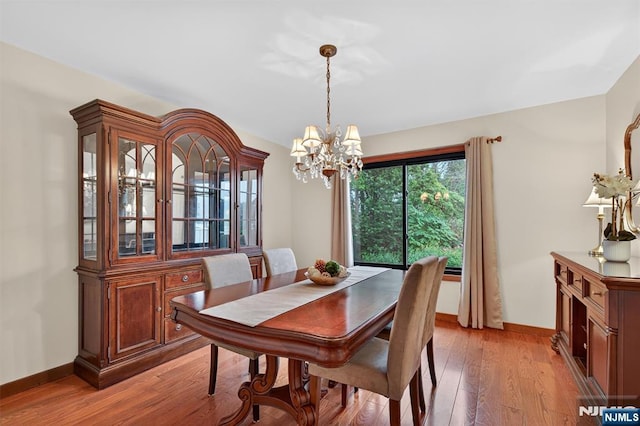 11 Country Ln, Mahwah, NJ 07430 - dining room featuring a chandelier and light wood-style floors