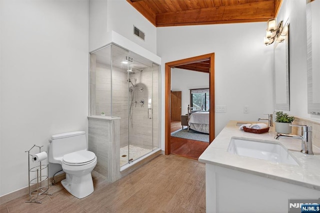 11 Country Ln, Mahwah, NJ 07430 - ensuite bathroom featuring wooden ceiling, double vanity, a stall shower, wood finished floors, and lofted ceiling