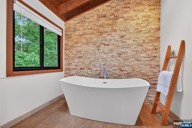 11 Country Ln, Mahwah, NJ 07430 - bathroom with a freestanding tub, wood ceiling, and wood finished floors