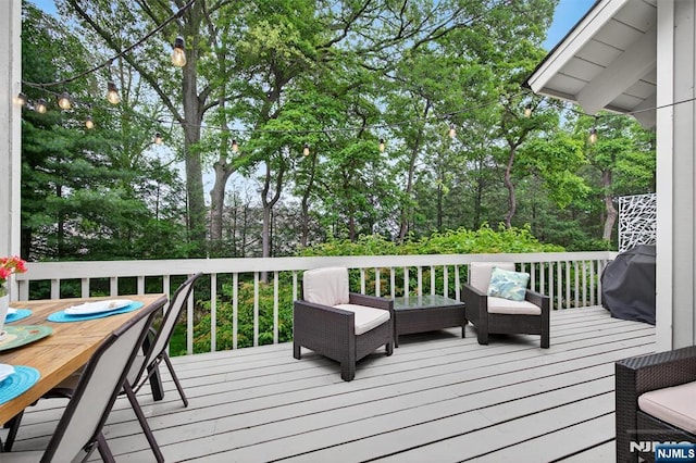 11 Country Ln, Mahwah, NJ 07430 - wooden deck with area for grilling and view of scattered trees