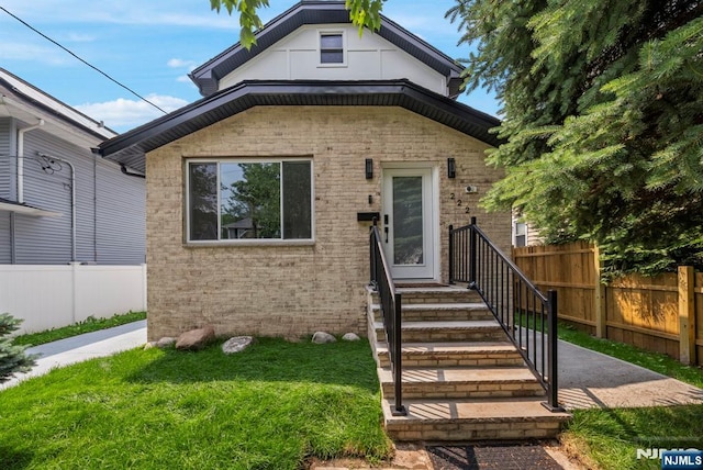 222 4th St, Ridgefield Park, NJ 07660 - view of front of home featuring brick siding and entry steps