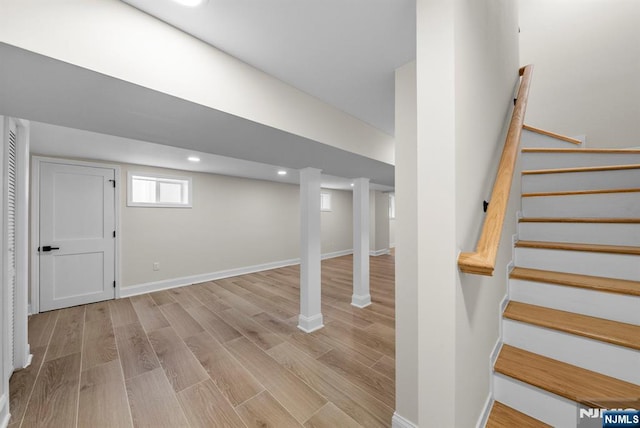 222 4th St, Ridgefield Park, NJ 07660 - basement featuring light wood-style flooring, stairway, and recessed lighting