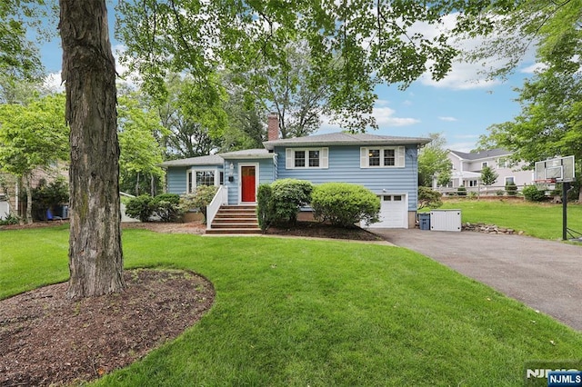 21 Valley Forge Way, Ho-Ho-Kus, NJ 07423 - split level home with asphalt driveway, an attached garage, a front lawn, and a chimney