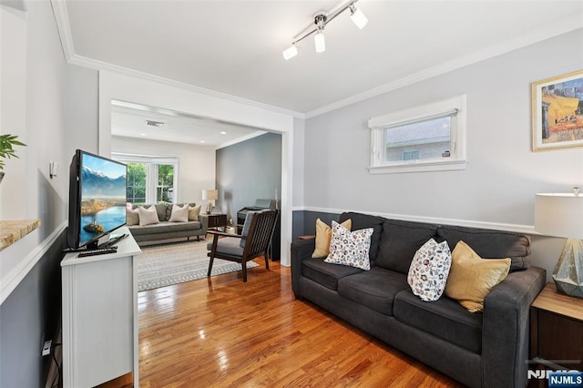21 Valley Forge Way, Ho-Ho-Kus, NJ 07423 - living room featuring light wood finished floors and crown molding