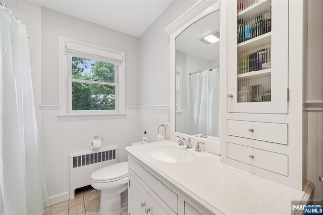 21 Valley Forge Way, Ho-Ho-Kus, NJ 07423 - full bath with radiator, a wainscoted wall, vanity, tile patterned floors, and curtained shower