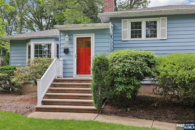 21 Valley Forge Way, Ho-Ho-Kus, NJ 07423 - property entrance with a chimney