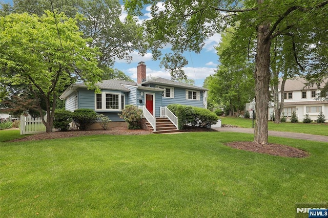21 Valley Forge Way, Ho-Ho-Kus, NJ 07423 - view of front of house with a chimney and driveway