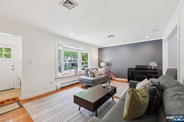 21 Valley Forge Way, Ho-Ho-Kus, NJ 07423 - living area featuring plenty of natural light, a baseboard heating unit, wood finished floors, crown molding, and recessed lighting
