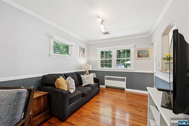21 Valley Forge Way, Ho-Ho-Kus, NJ 07423 - living room with radiator, healthy amount of natural light, wood finished floors, and crown molding