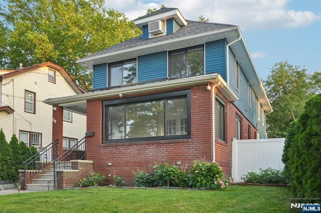 26 Amsterdam Ave, Teaneck, NJ 07666 - american foursquare style home featuring brick siding