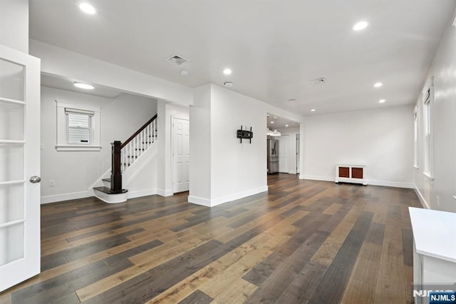 26 Amsterdam Ave, Teaneck, NJ 07666 - unfurnished living room featuring stairway, wood finished floors, and recessed lighting
