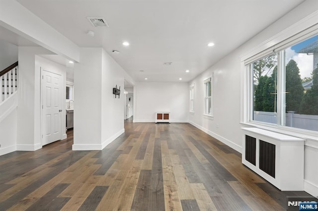 26 Amsterdam Ave, Teaneck, NJ 07666 - unfurnished living room with stairs, wood finished floors, and recessed lighting