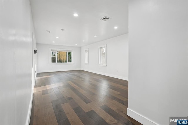 26 Amsterdam Ave, Teaneck, NJ 07666 - unfurnished room with dark wood finished floors and recessed lighting