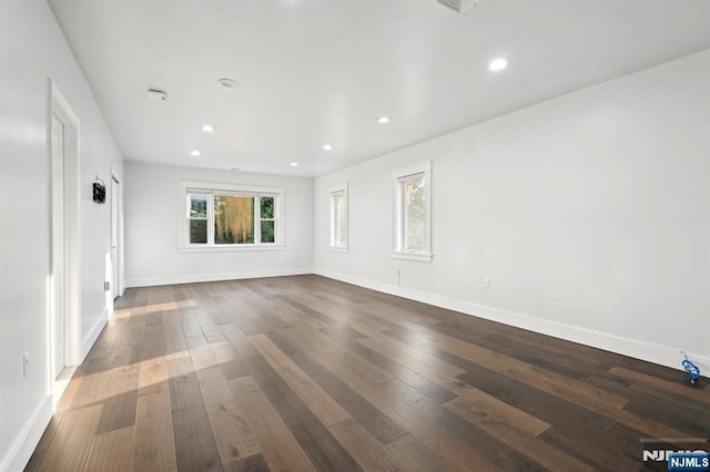 26 Amsterdam Ave, Teaneck, NJ 07666 - empty room with dark wood-style floors and recessed lighting