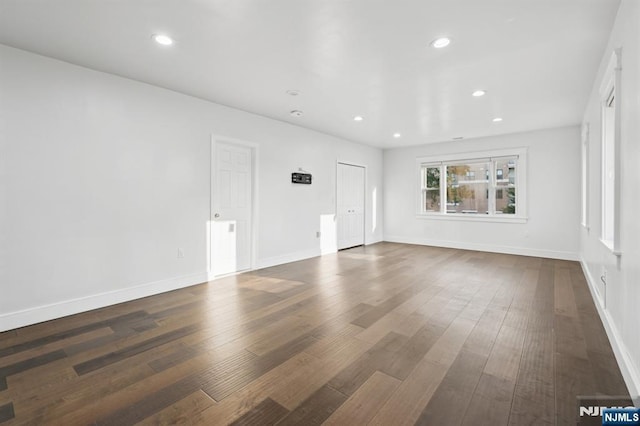 26 Amsterdam Ave, Teaneck, NJ 07666 - spare room with dark wood-style flooring and recessed lighting