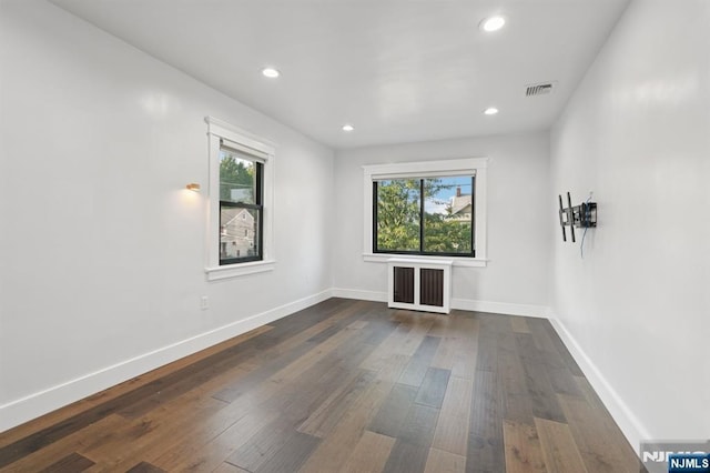 26 Amsterdam Ave, Teaneck, NJ 07666 - spare room featuring dark wood-style floors and recessed lighting