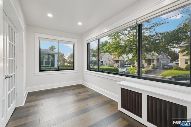 26 Amsterdam Ave, Teaneck, NJ 07666 - unfurnished room with radiator, recessed lighting, and dark wood finished floors