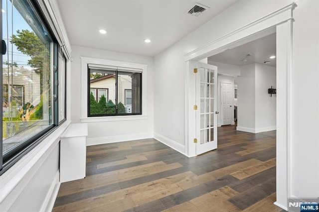 26 Amsterdam Ave, Teaneck, NJ 07666 - empty room with wood finished floors, recessed lighting, and french doors