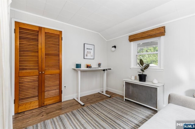 286 Willow Ave, Lyndhurst, NJ 07071 - living area featuring ornamental molding, wood finished floors, and lofted ceiling