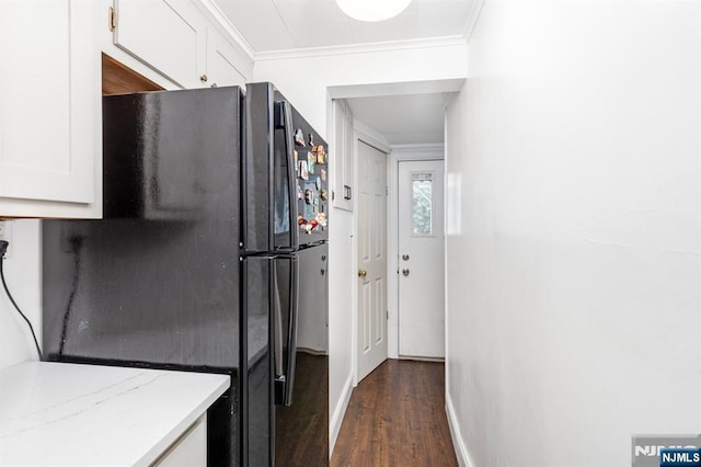 286 Willow Ave, Lyndhurst, NJ 07071 - kitchen featuring freestanding refrigerator, white cabinetry, crown molding, dark wood-style floors, and light stone counters