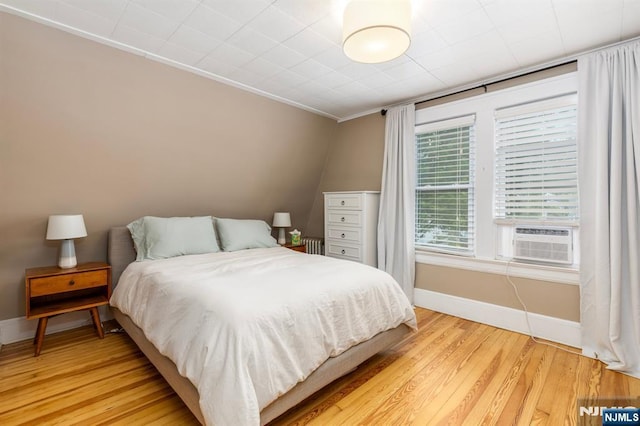 286 Willow Ave, Lyndhurst, NJ 07071 - bedroom with light wood-style flooring, cooling unit, and ornamental molding