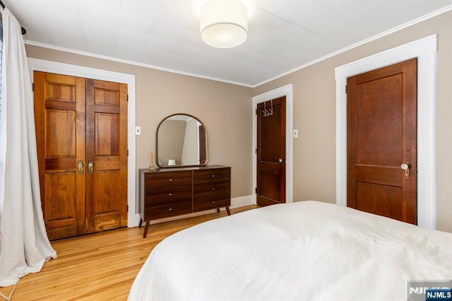 286 Willow Ave, Lyndhurst, NJ 07071 - bedroom featuring light wood-type flooring and ornamental molding