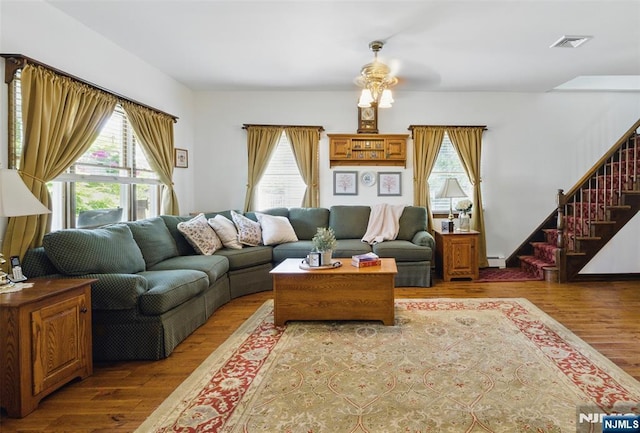 36 First, Hawthorne, NJ 07506 - living area featuring healthy amount of natural light, wood finished floors, and stairs