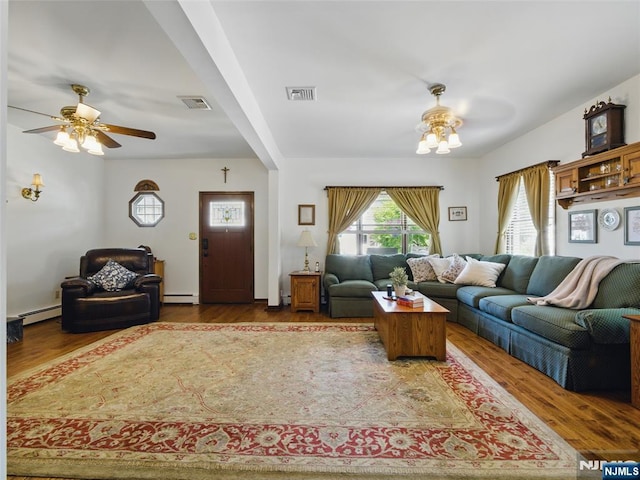 36 First, Hawthorne, NJ 07506 - living room with baseboard heating, wood finished floors, and ceiling fan