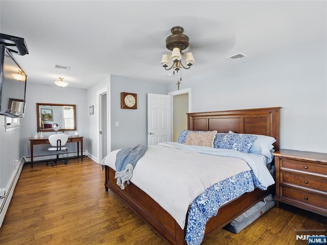 36 First, Hawthorne, NJ 07506 - bedroom with wood finished floors, a baseboard heating unit, and an office area