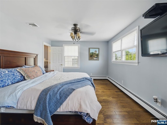 36 First, Hawthorne, NJ 07506 - bedroom featuring baseboard heating, dark wood finished floors, and ceiling fan