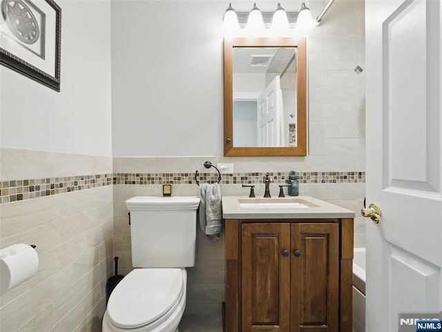 36 First, Hawthorne, NJ 07506 - bathroom featuring tile walls and vanity