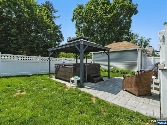 36 First, Hawthorne, NJ 07506 - fenced backyard featuring a hot tub, a patio, and a gazebo