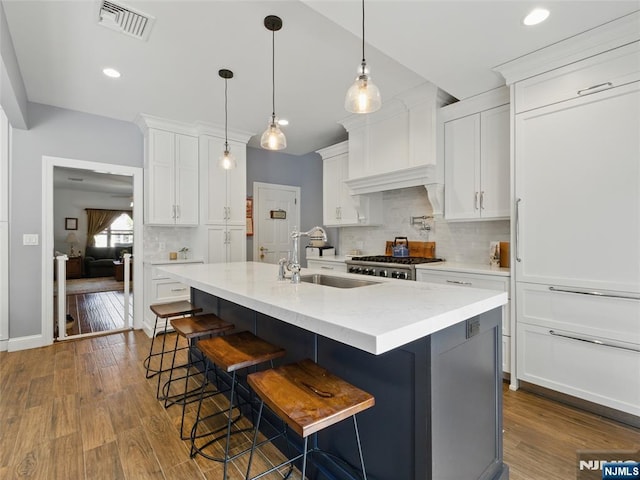 36 First, Hawthorne, NJ 07506 - kitchen with range, white cabinetry, backsplash, dark wood-style flooring, and recessed lighting
