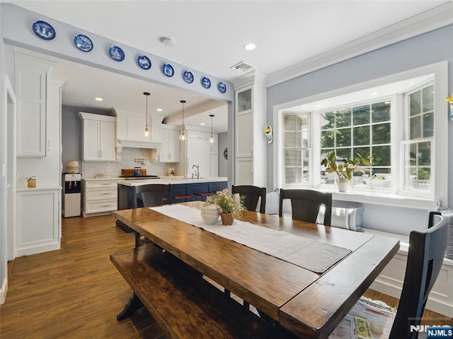 36 First, Hawthorne, NJ 07506 - dining room featuring dark wood-type flooring, ornamental molding, and recessed lighting
