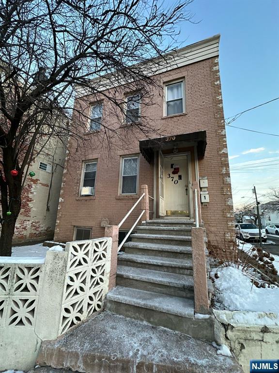 370 Main St, Lodi, NJ 07644 - view of front of home featuring brick siding